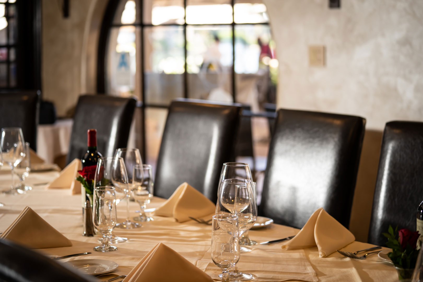 Boccaccio's private wine room with a banquet table set up for a private event
